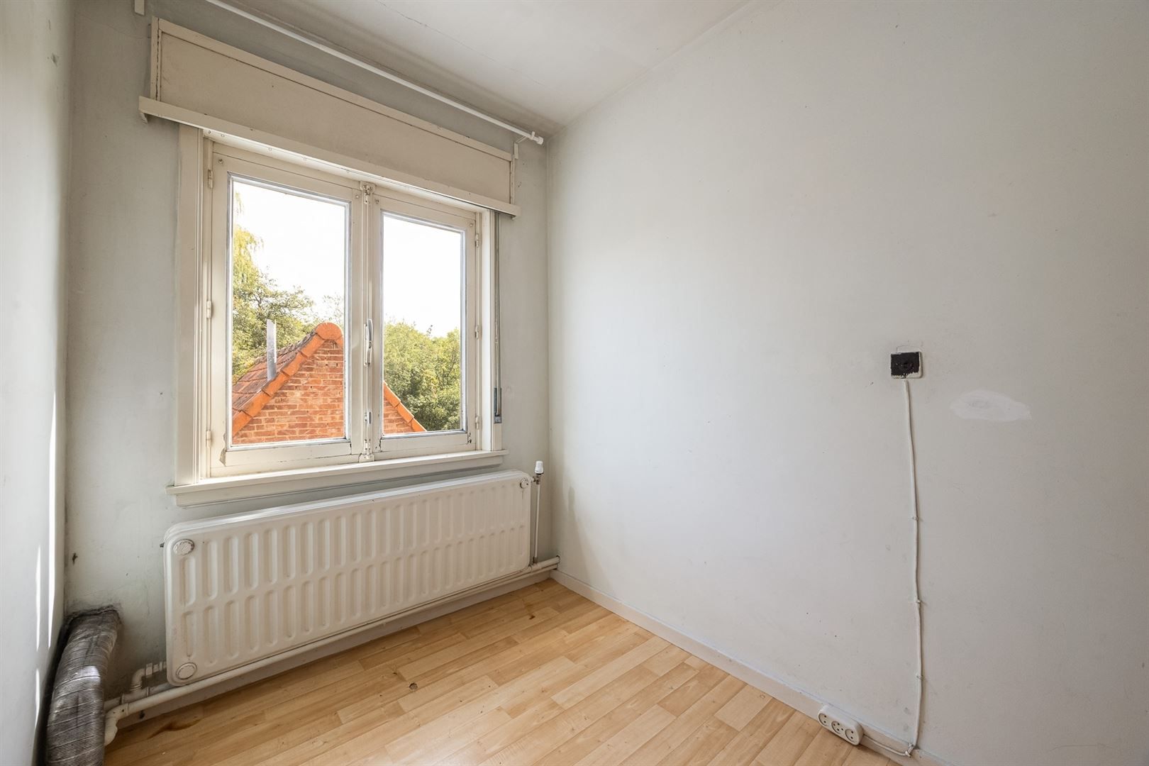 Halfopen woning in kindvriendelijke straat foto 12