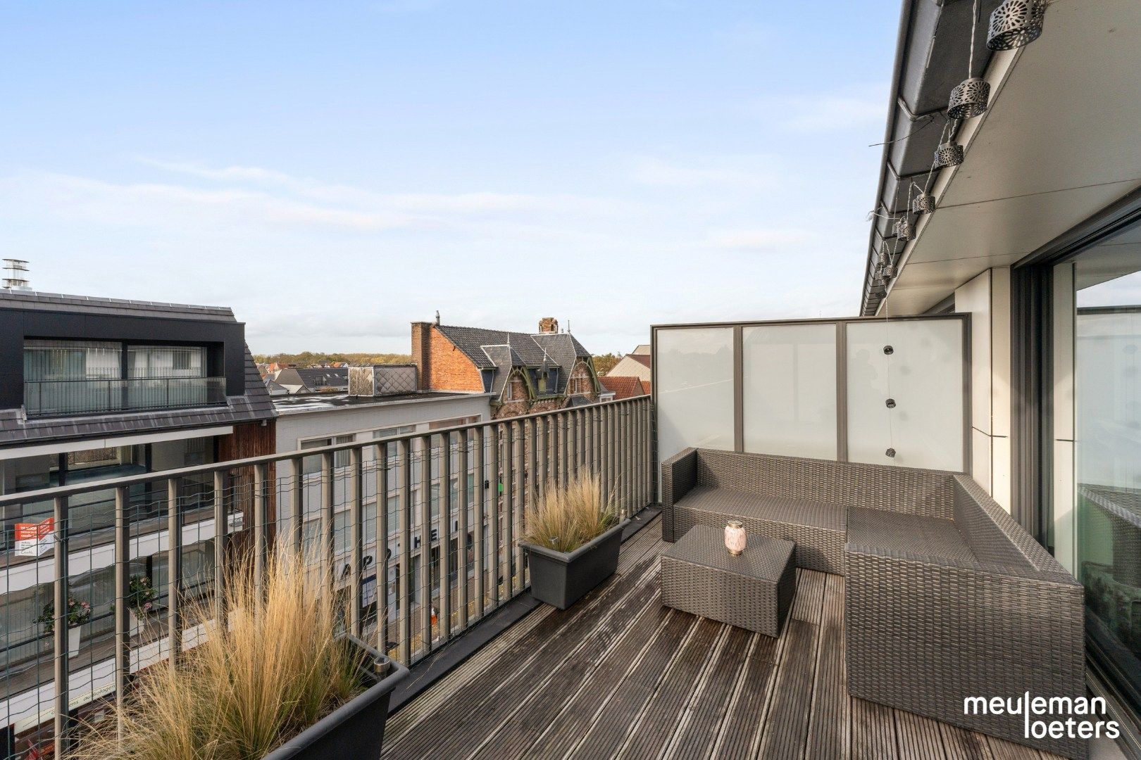 Lichtrijk duplexappartement met ruim terras en garage foto 2