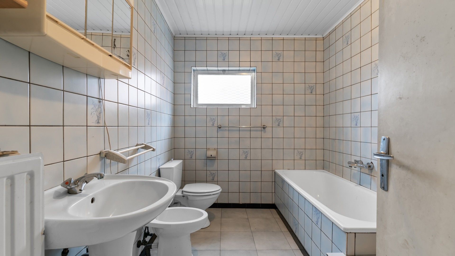 Te renoveren woning met 4 slpk's op een perceel van 3a 20 ca foto 9