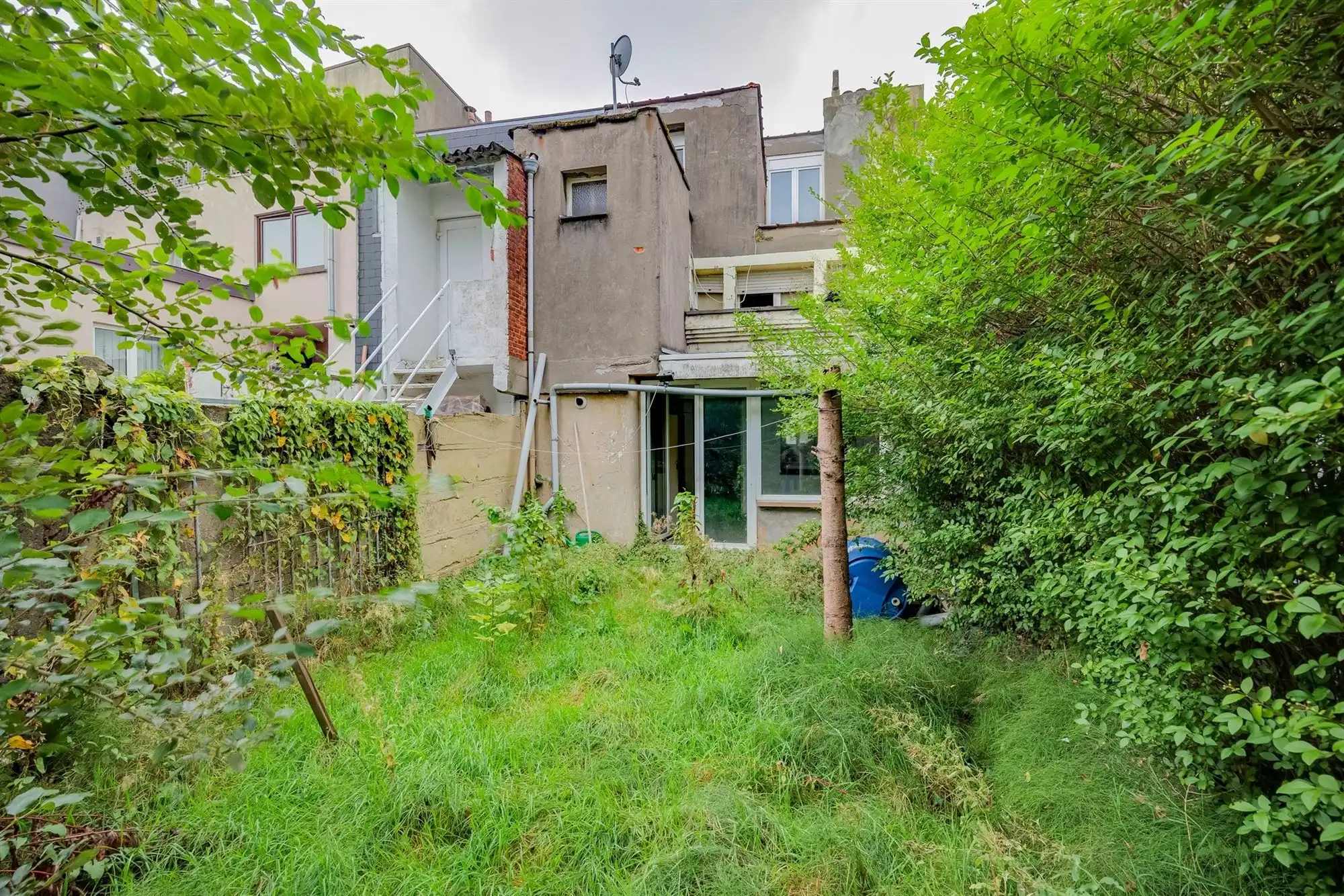 Volledig te renoveren huis met ruime tuin en tal van mogelijkheden! foto 10