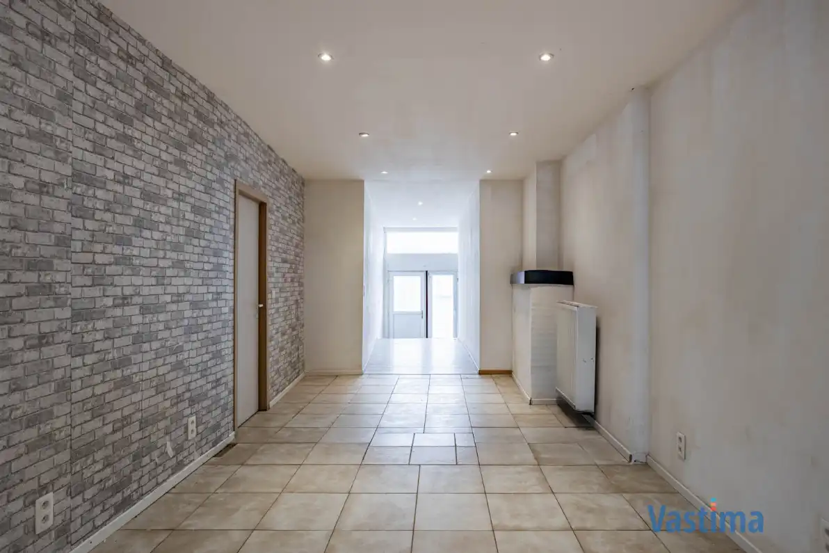 Op te frissen woning met potentieel in Erembodegem foto 4