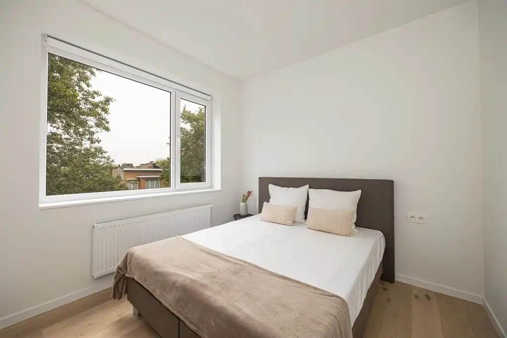 Stijlvol nieuwbouwappartement met terras foto 10