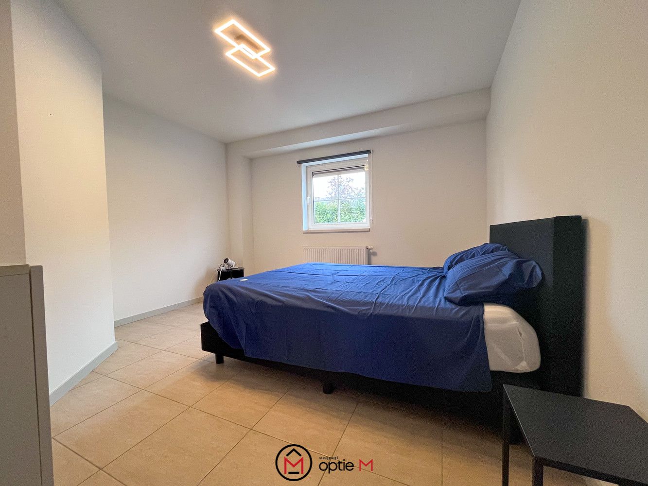 Gelijkvloers appartement met garage en terras in het hart van Munsterbilzen foto 9