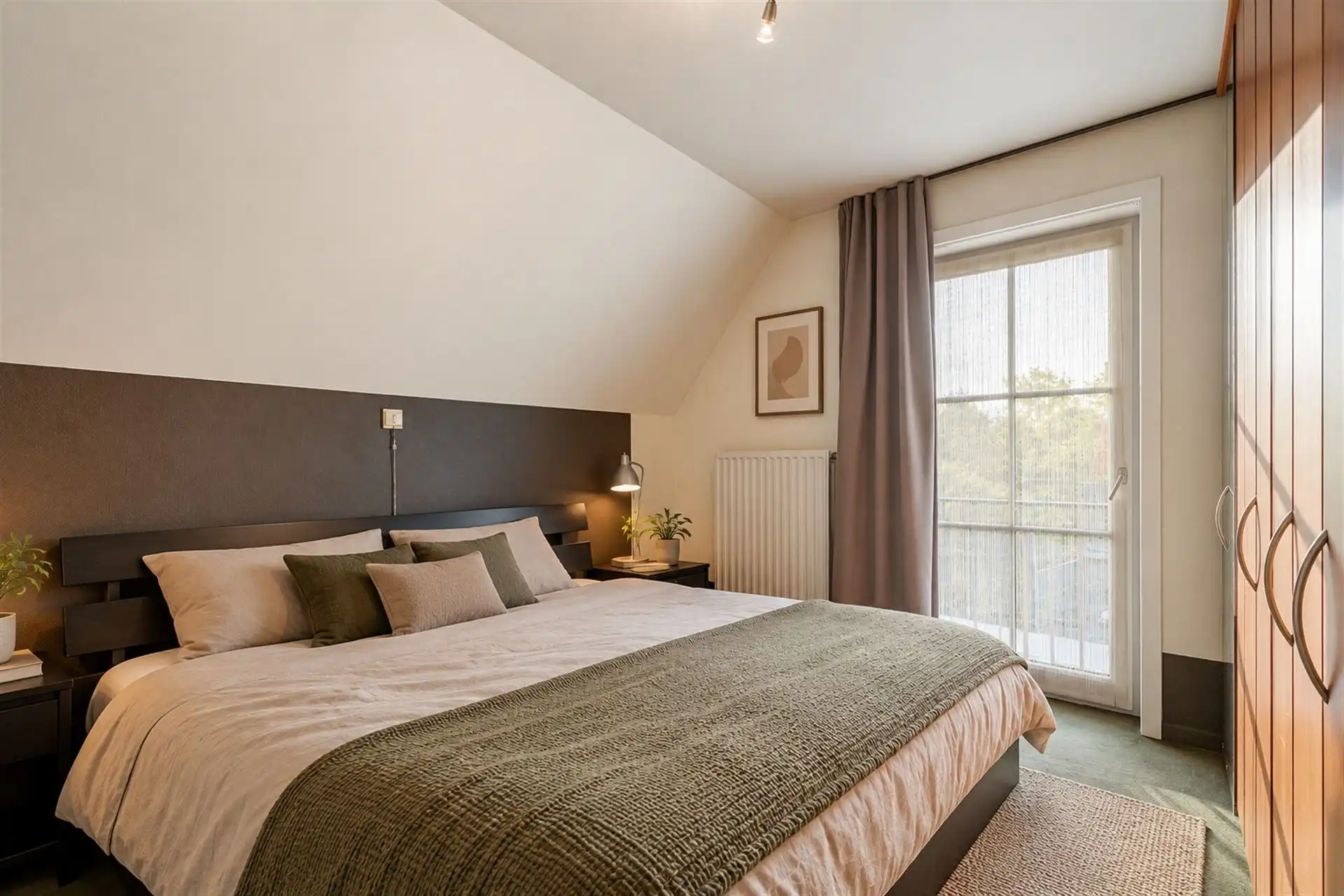 Ruim en instapklaar appartement met 2 slaapkamers en garage foto 8