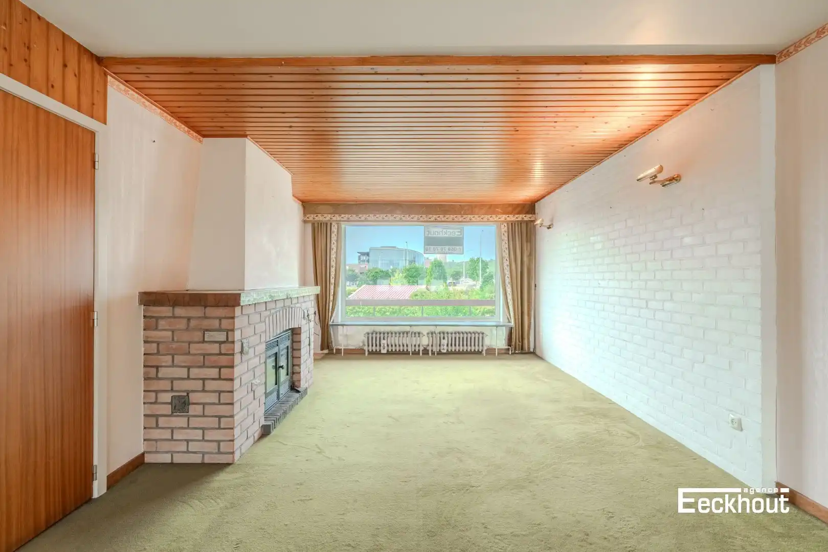 Te moderniseren woning op goede ligging met garage en tuin! foto 3