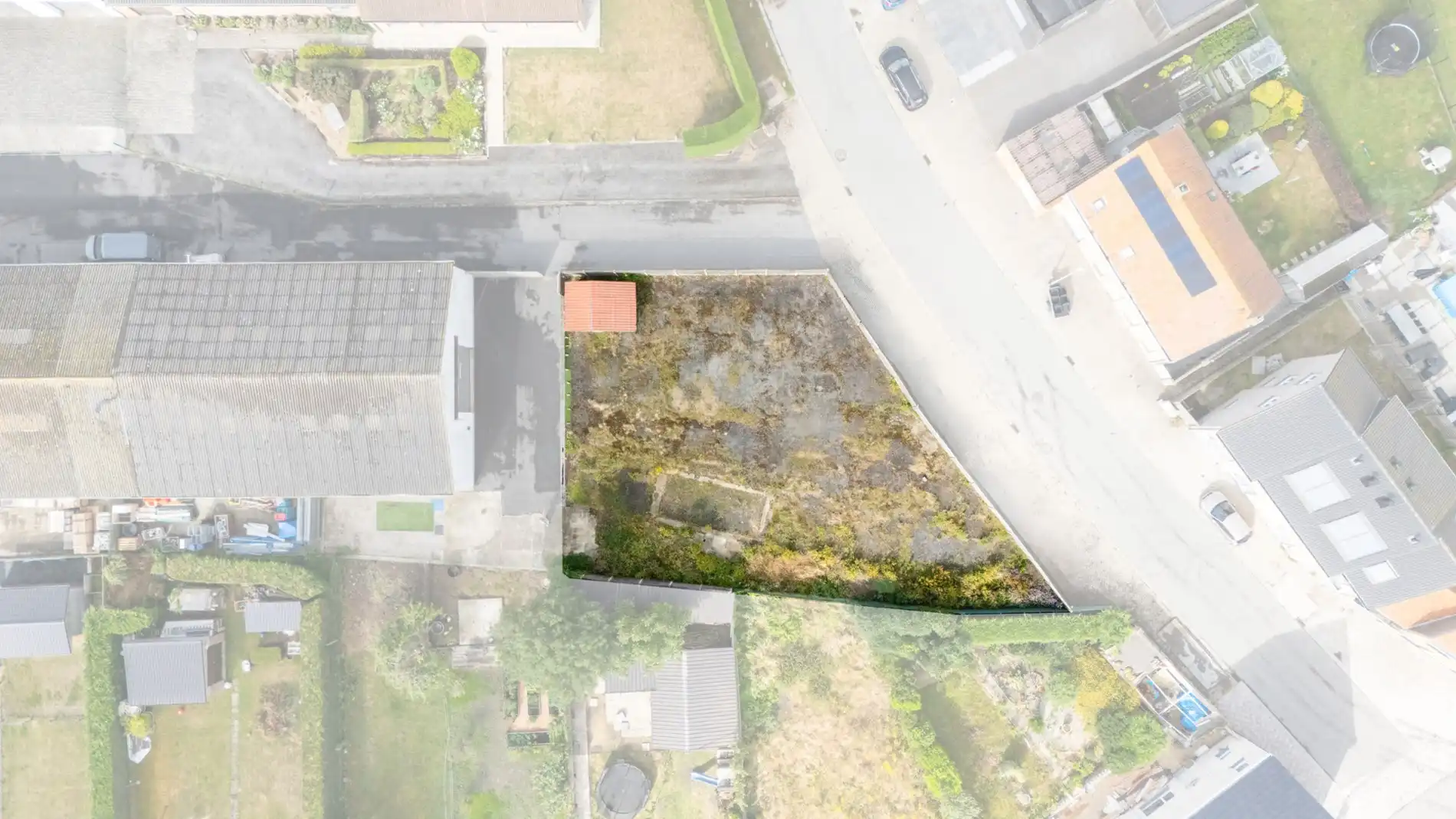 Te koop: Unieke bouwgrond in het hart van pittoresk Slijpe – 748 m² in een groene omgeving foto {{pictureIndex}}