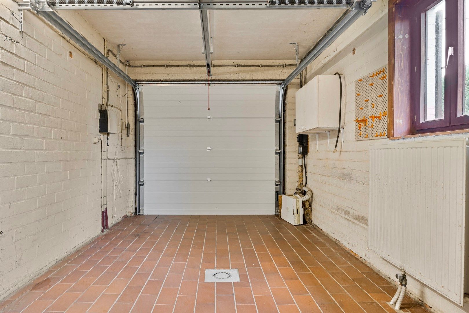 Te renoveren vrijstaande woning met 4 slpks, garage en tuin foto 17