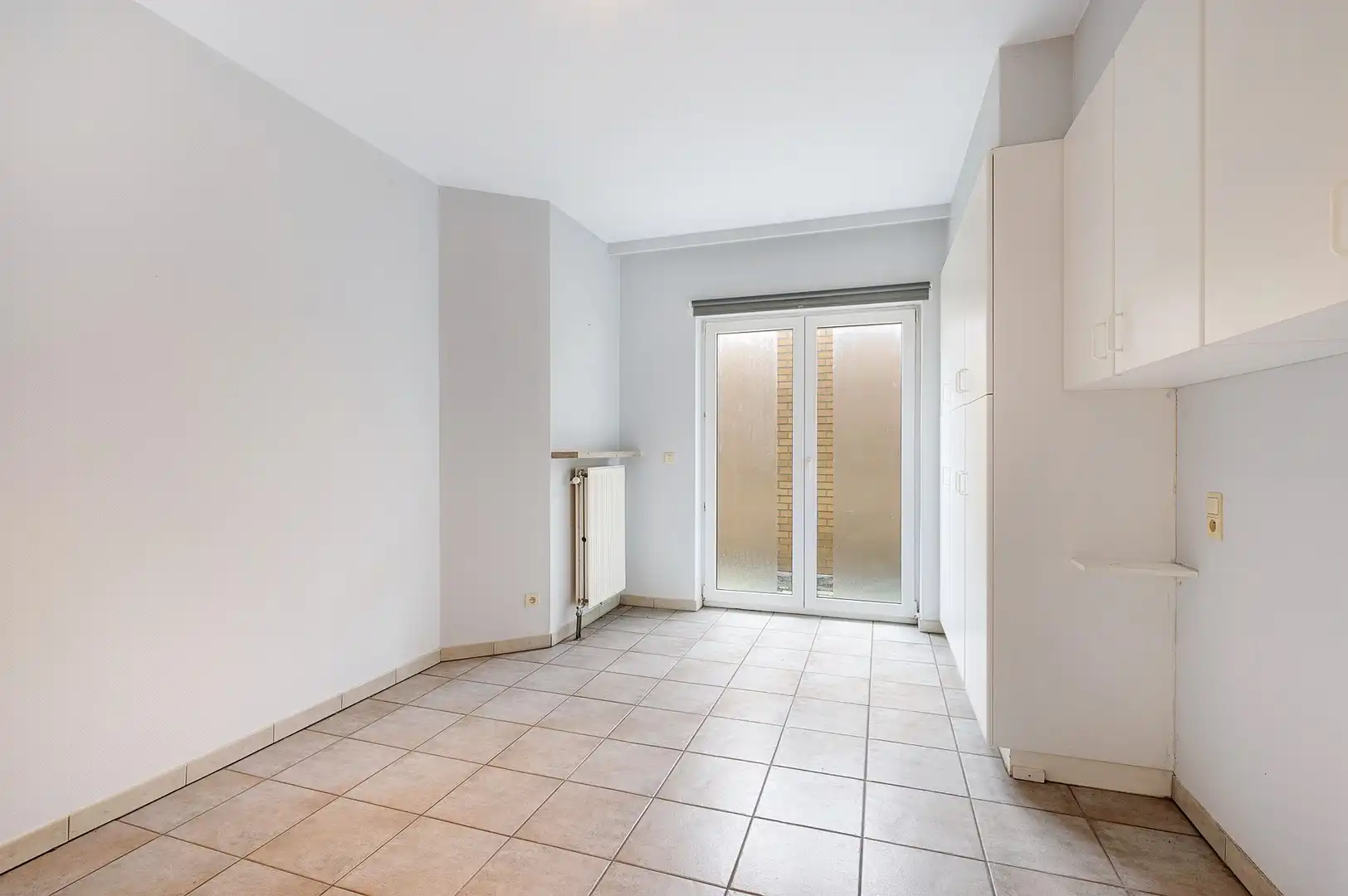 Te renoveren gelijkvloers appartement op topligging nabij het Rubensplein. foto 15