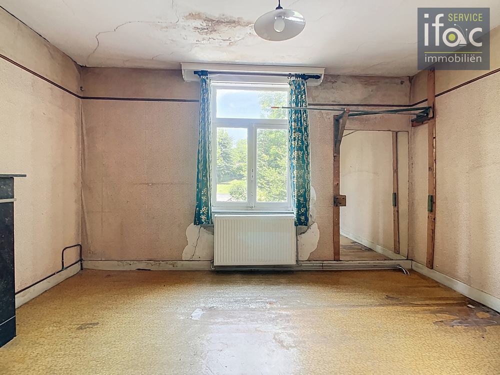 Rijhuis te koop foto 13