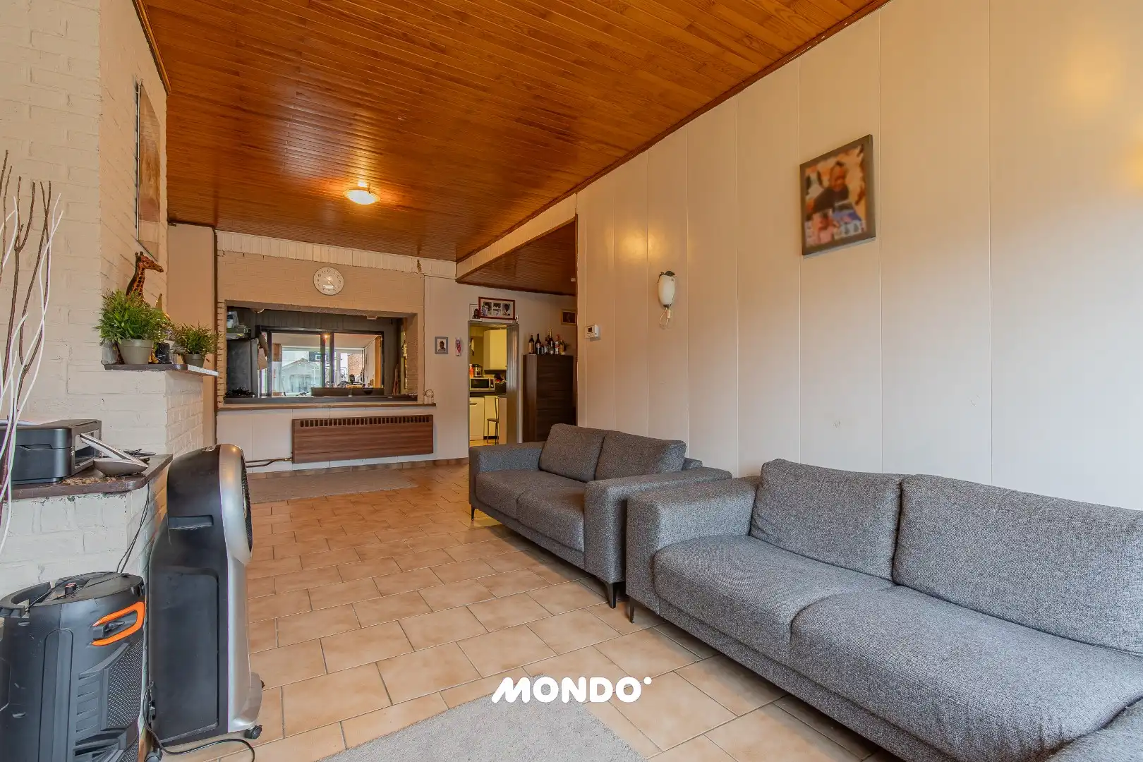 Deels gerenoveerde gezinswoning met 5 à 6 slaapkamers en tuin met achteruitweg foto 4