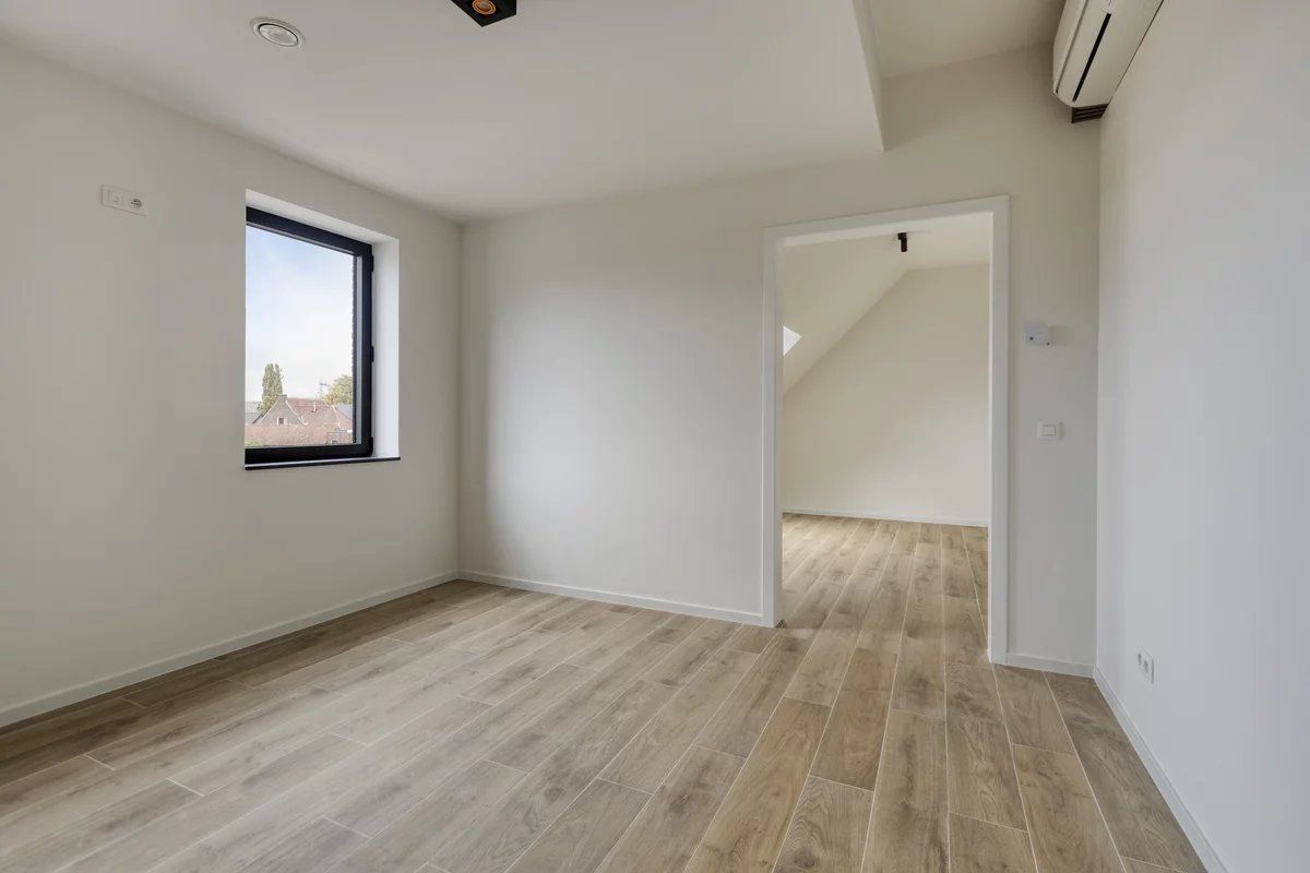 EXCLUSIEF EN KWALITATIEF NIEUWBOUWAPPARTEMENT VAN 163 M² MET 3 SLPK'S, 2 BADK'S EN RIANTE TERRASSEN IN MUNSTERBILZEN foto 22