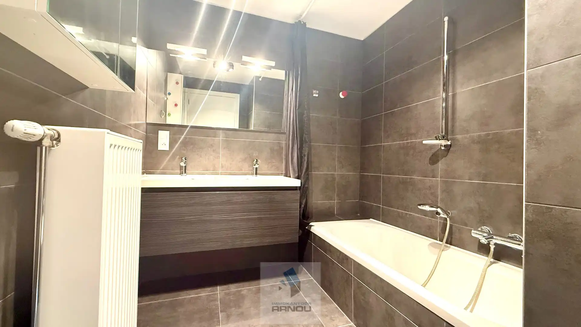 Wonen aan de Leie: 2-slaapkamerappartement in hartje Deinze foto 14