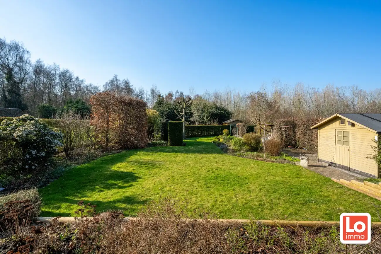 Degelijke open gelijkvloerse woning met inpandige garage en grote tuin op een groene toplocatie in Beervelde! foto 30