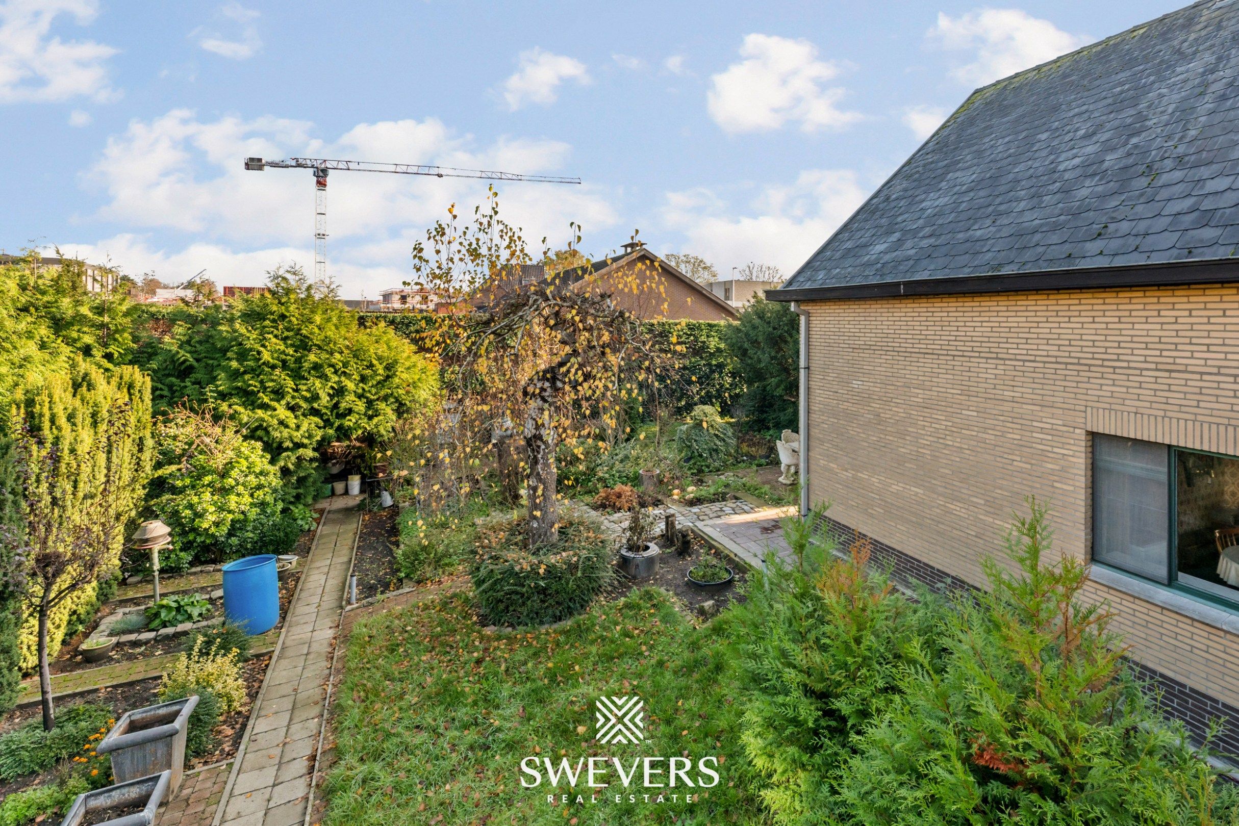 Ruime, te renoveren woning op 7a60 in centrum-Zonhoven foto 25