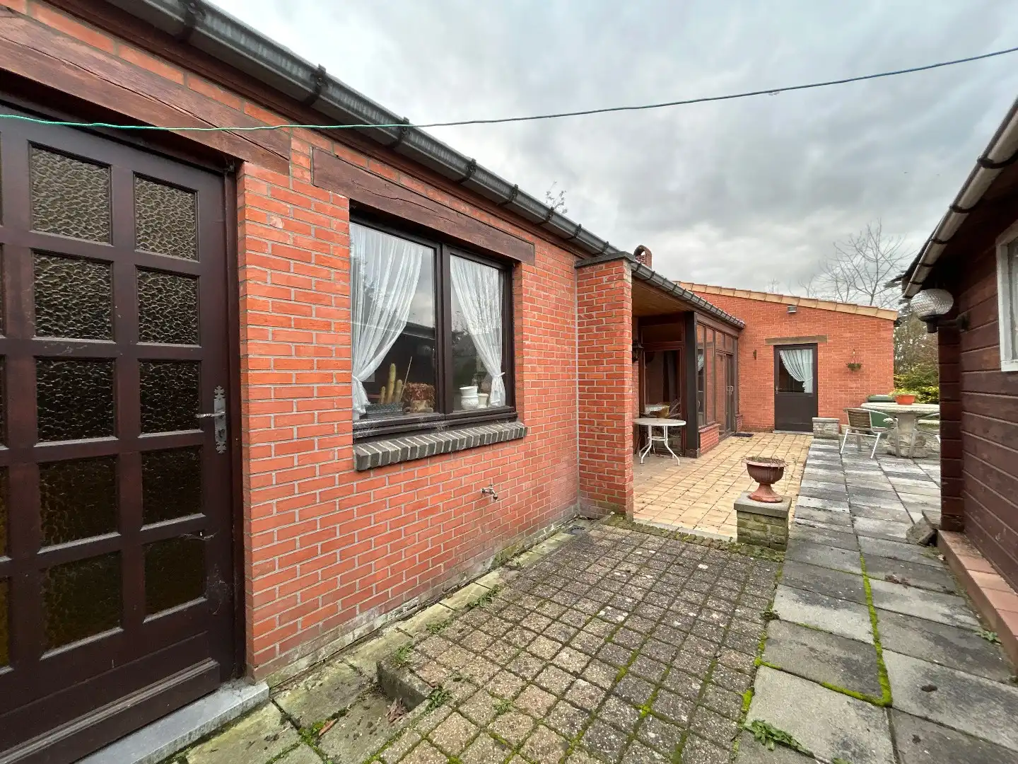 Gelijkvloerse gezinswoning in doodlopende straat. foto 24