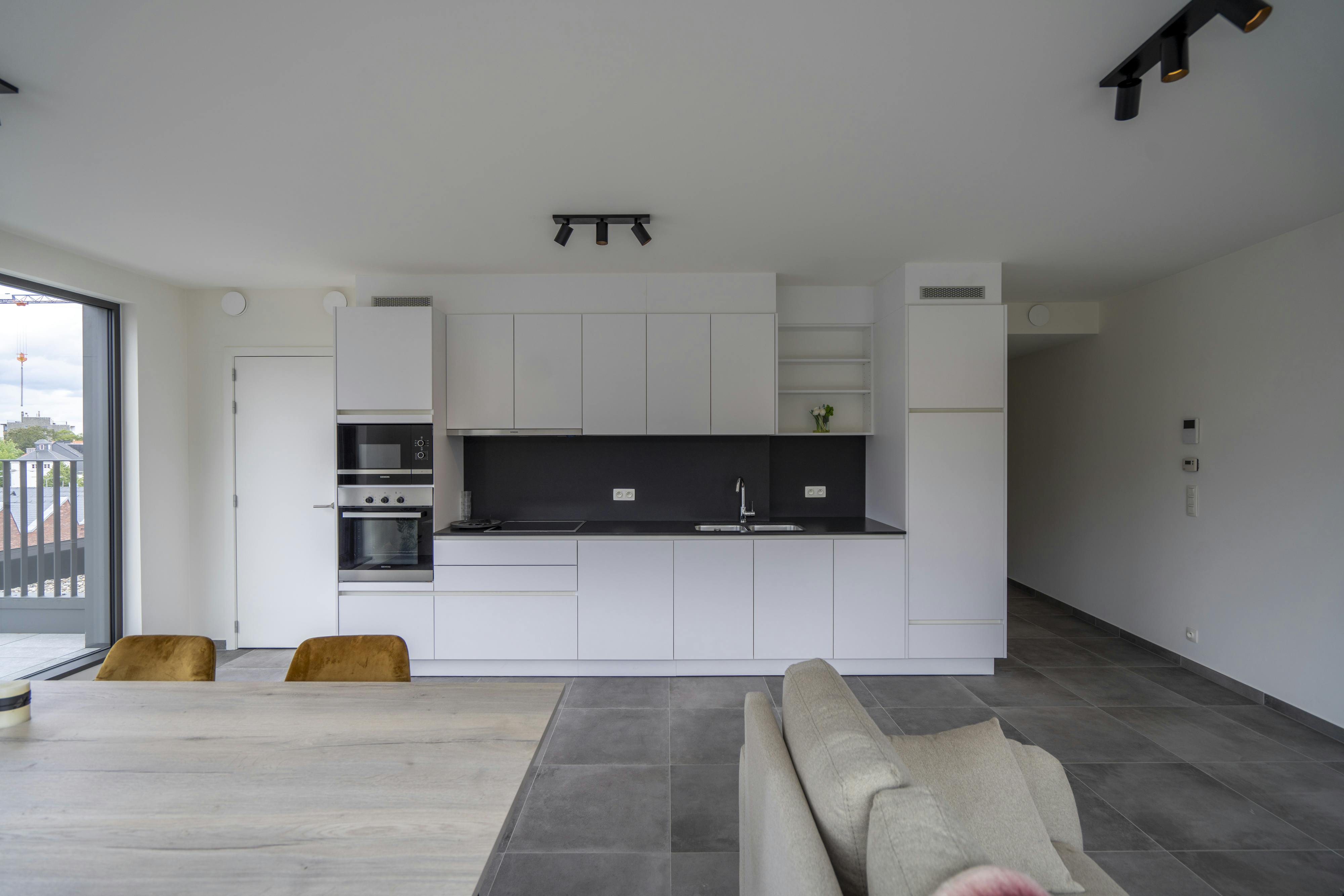 Instapklaar dakappartement / penthouse te koop in het centrum foto 13