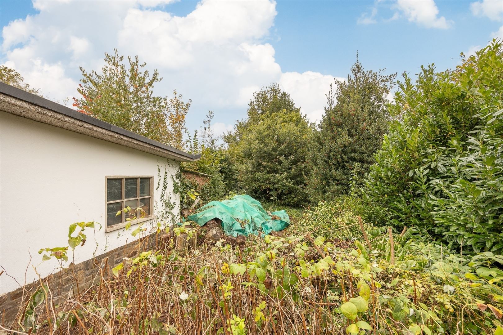 Goed gelegen pand met tuin en garage! foto 14