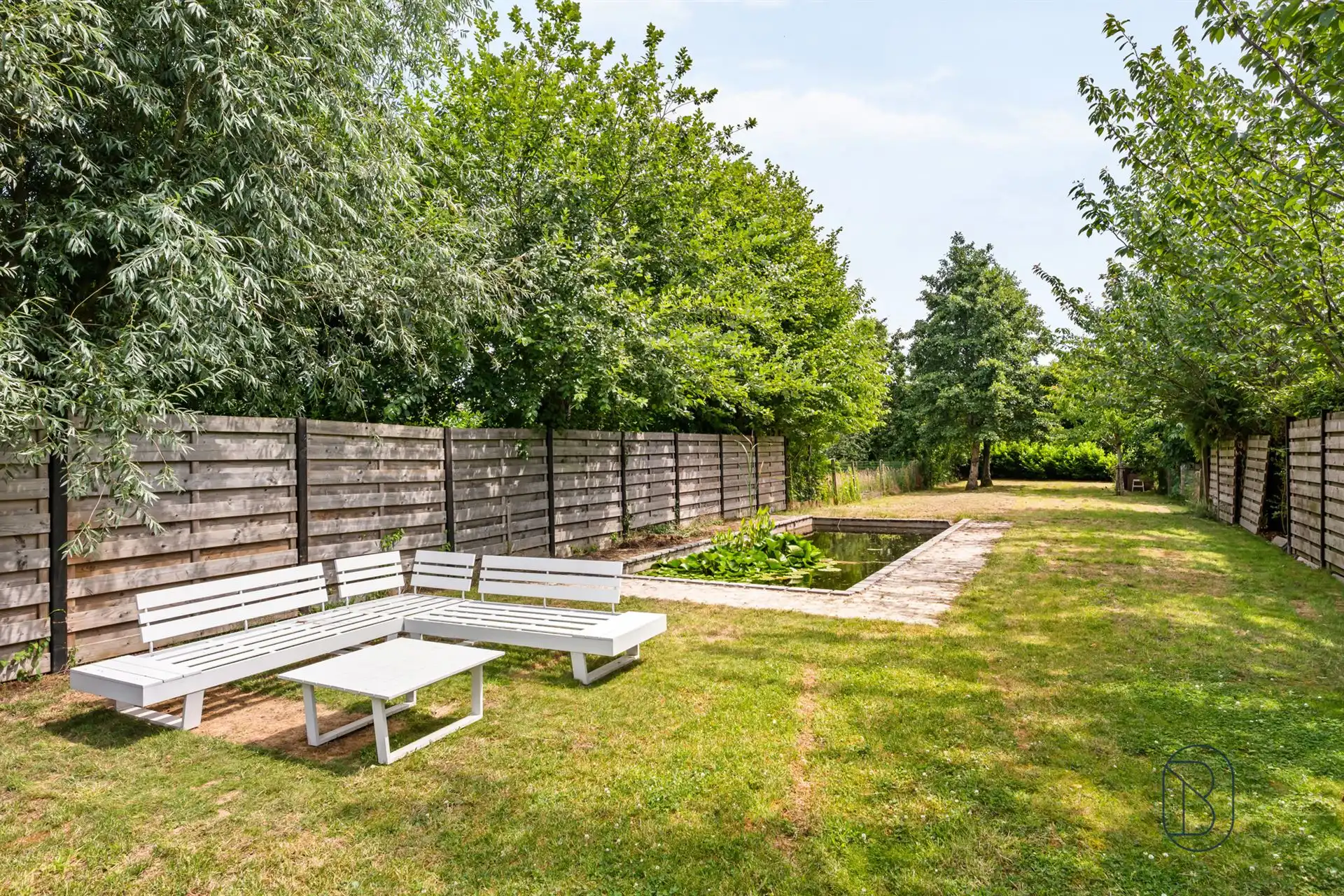Knap gerenoveerde woning met 3 à 4 slk, en zwemvijver foto 19