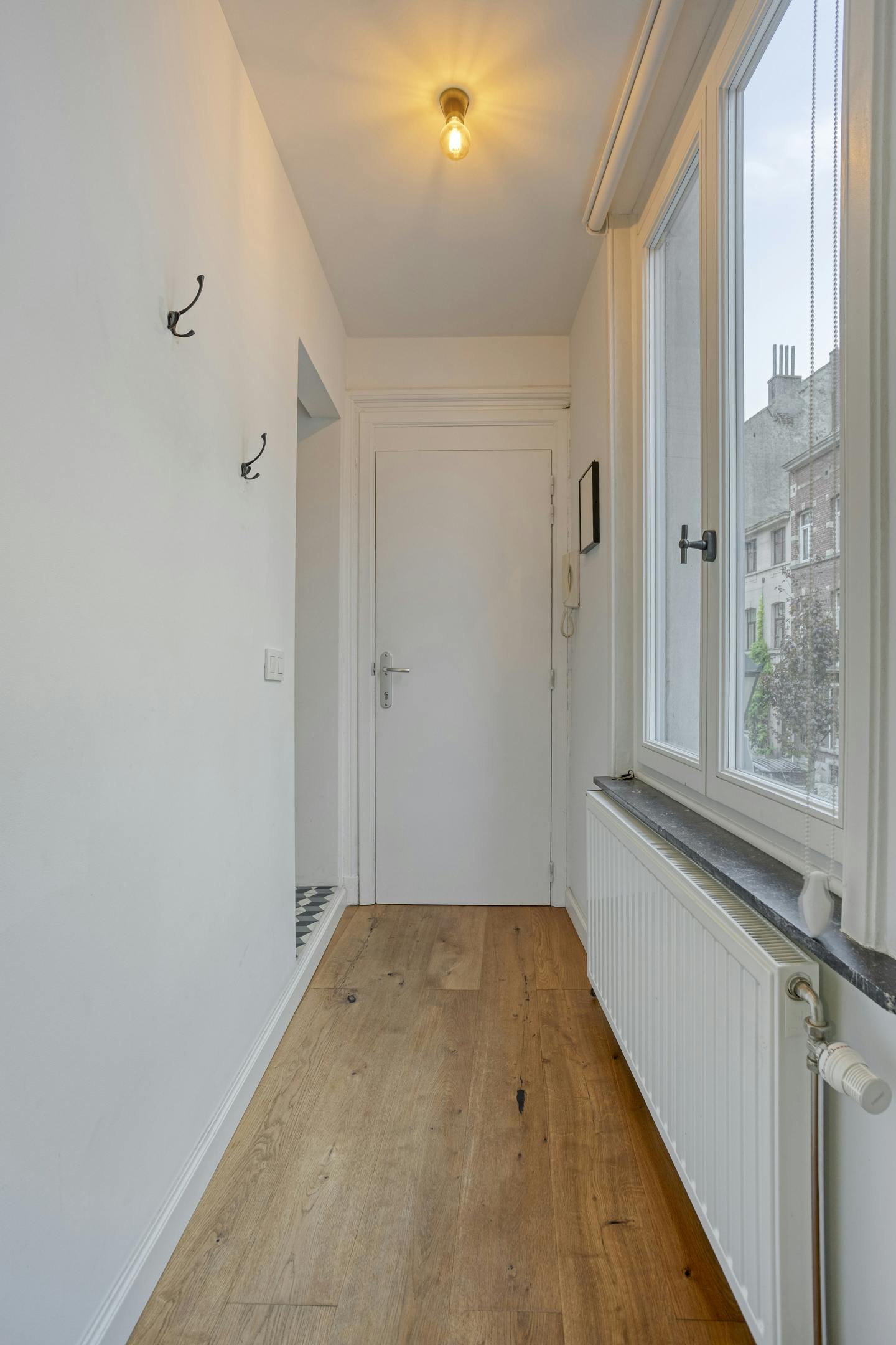 Duplex appartment te Sint-Gillis met 2 slaapkamers foto 5