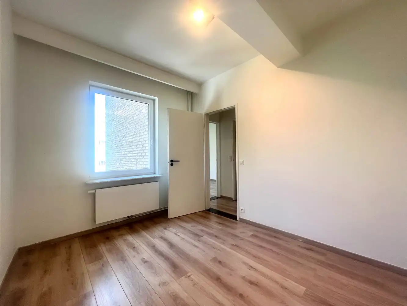 Gerenoveerd en ruim 2-slpk appartement te huur nabij het Stadspark! foto 15