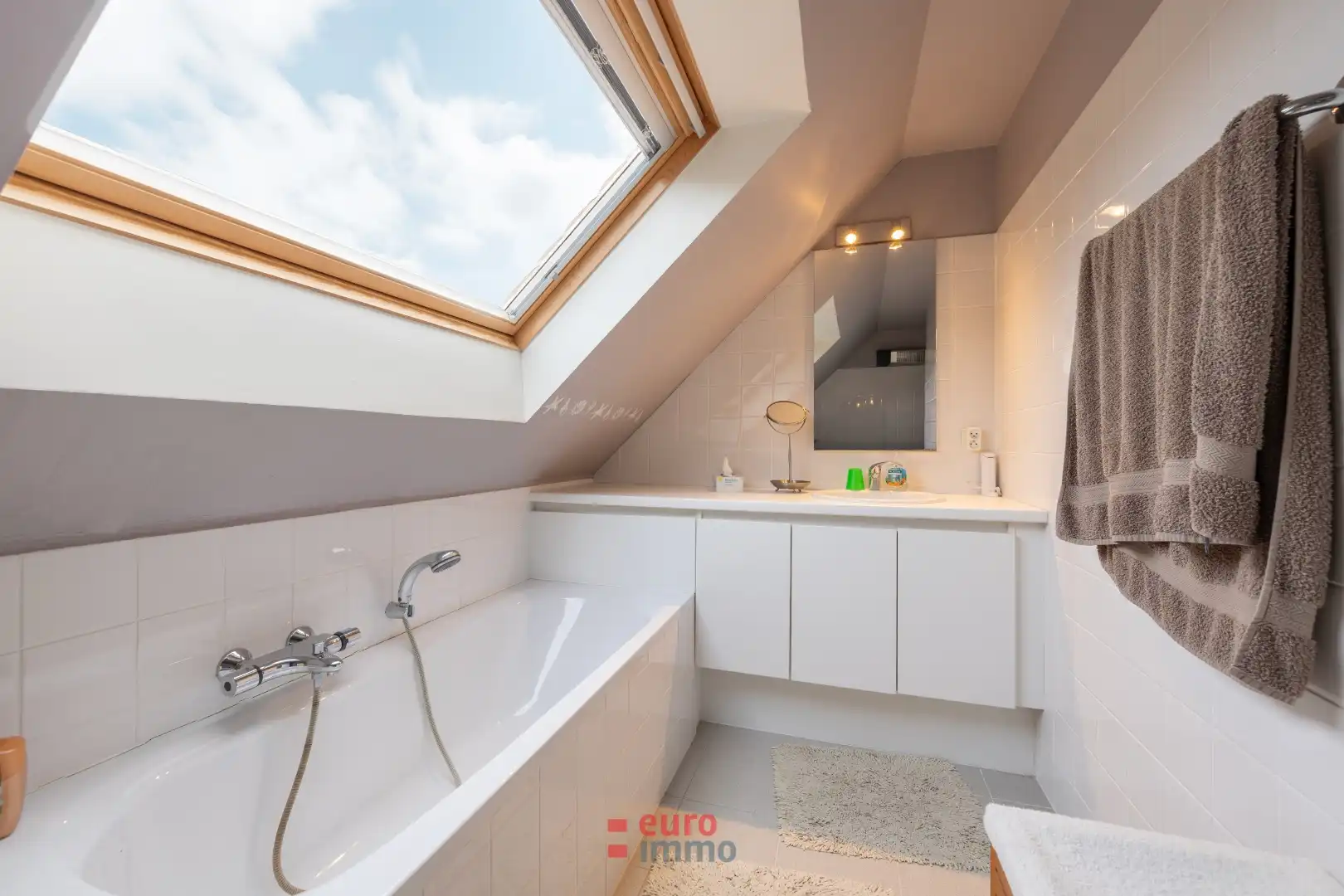 Uitermate lichtrijke penthouse midden in de winkelstraat! foto 11