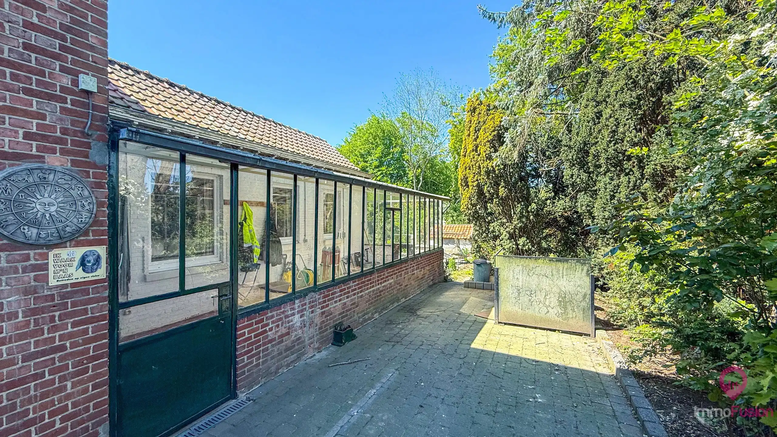 Te renoveren woning met 3 slpkms op ruim perceel van 8a58ca! foto 26