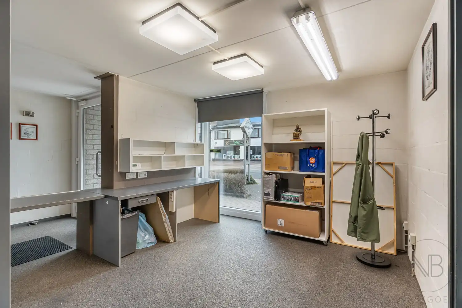 Pand met vergunde praktijkruimte, woonst, garage en carport in Opglabbeek foto 17