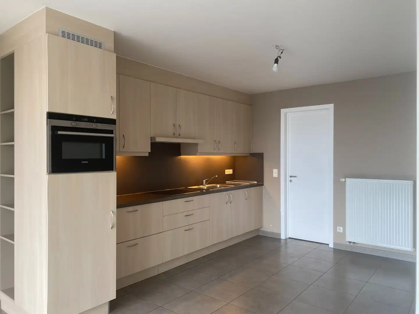 Verzorgd duplex appartement met 3 slaapkamers en autostaanplaats foto 2