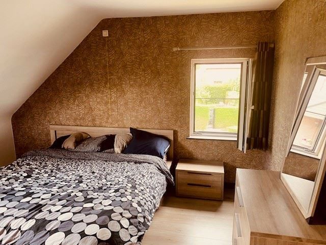 Gezellige halfopen woning met grote tuin foto 3