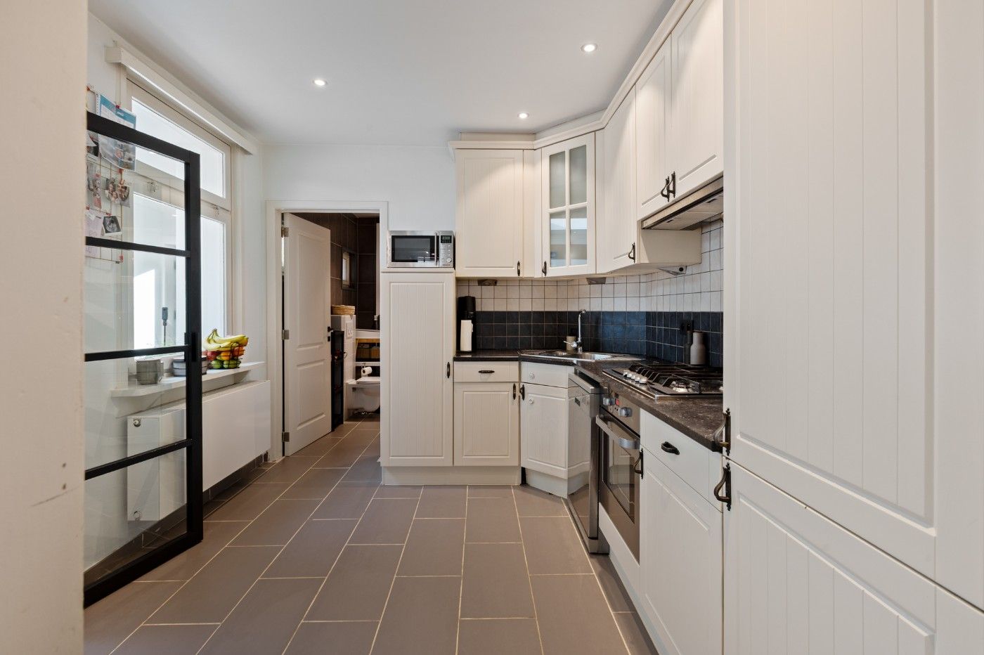 Toffe, instapklare woning met 3 slpk. en tuin foto 7