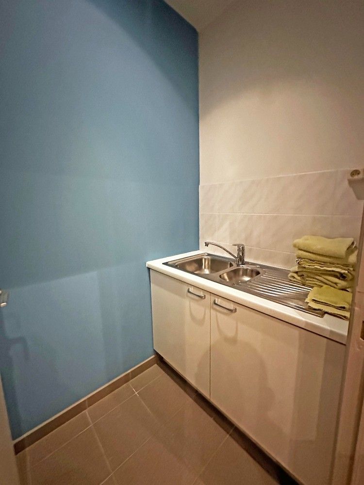 Opbrengsteigendom (praktijk + 2 appartementen) in Wijnegem centrum te koop! foto 38