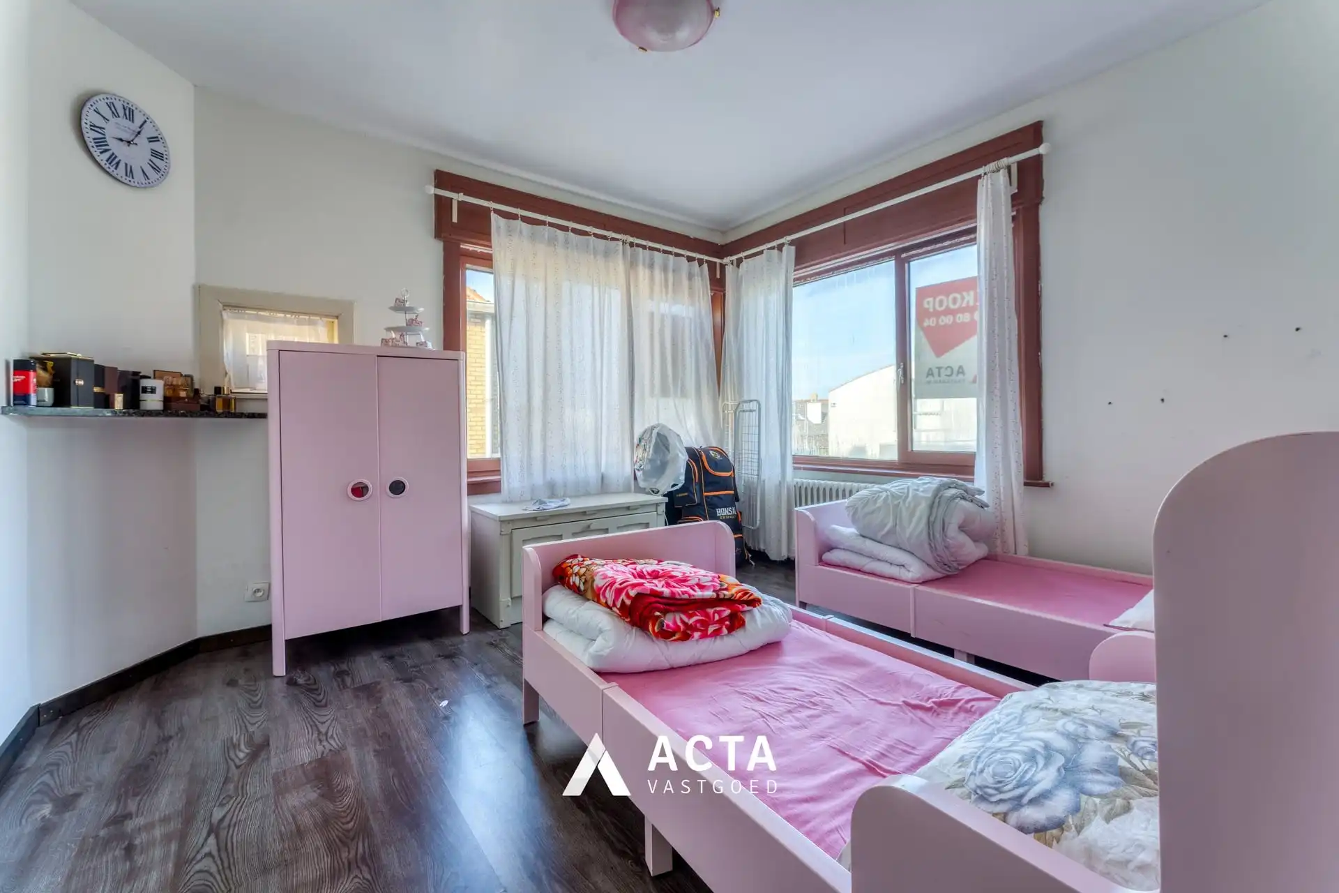 Halfopen bebouwing met vier slaapkamers in Mariakerke foto 12