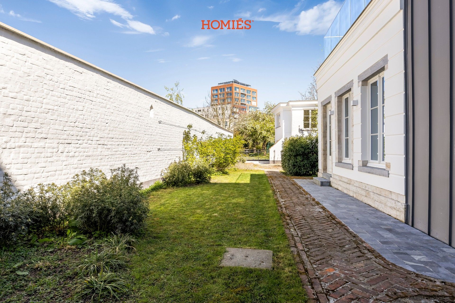 High-end gelijkvloers appartement met tuin, in historisch pand foto 18