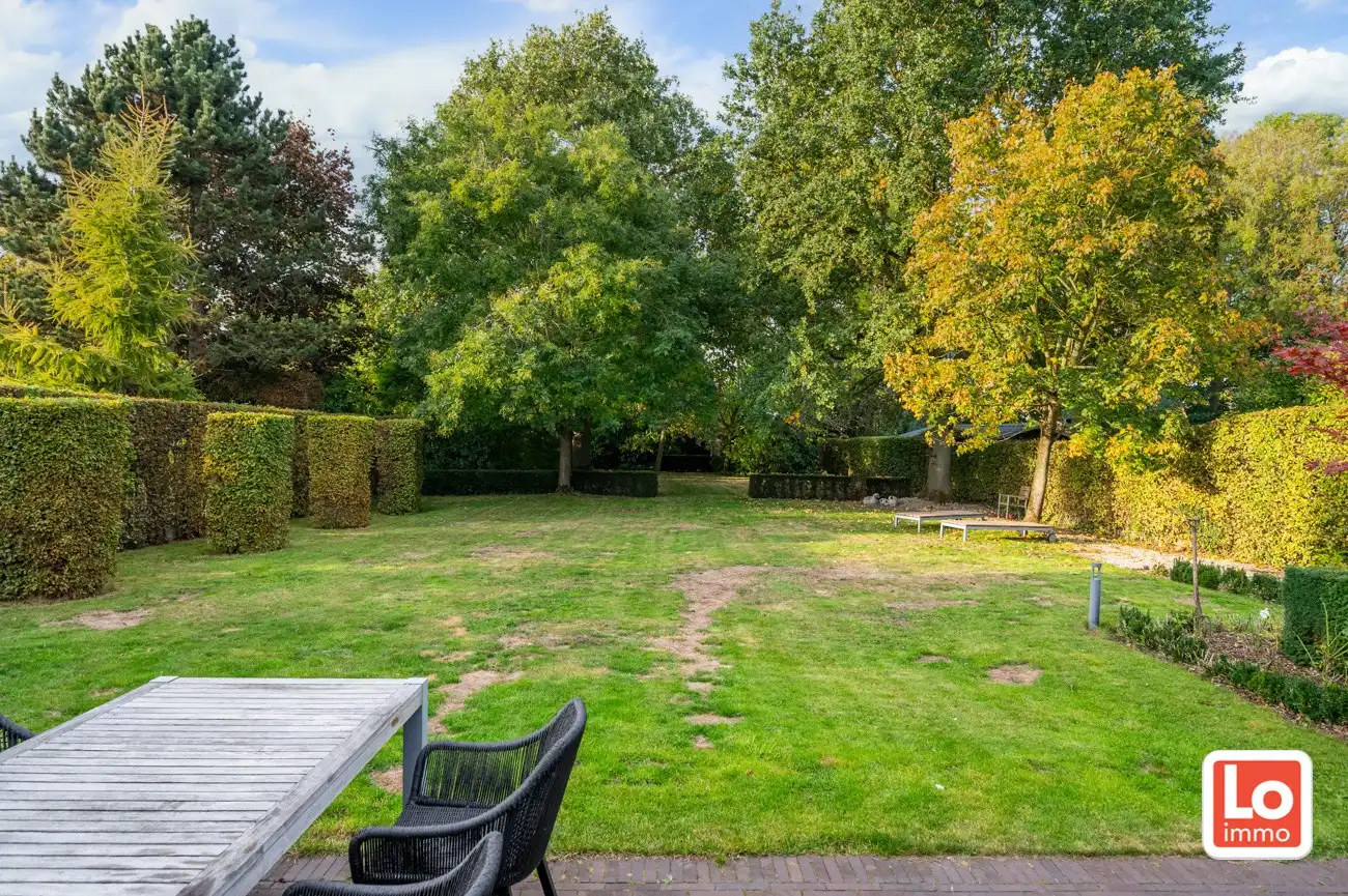 VERKOCHT! Charmante alleenstaande woning met inpandige garage en grote tuin op een rustige, groene locatie nabij het centrum van Beervelde! foto 24
