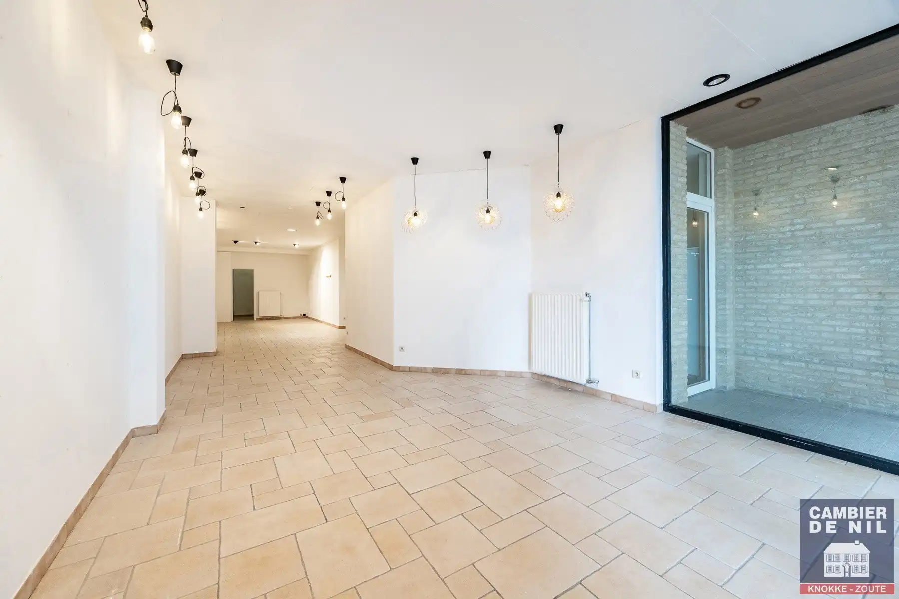 Ideaal gelegen handelspand gelegen aan het Rubensplein foto 4