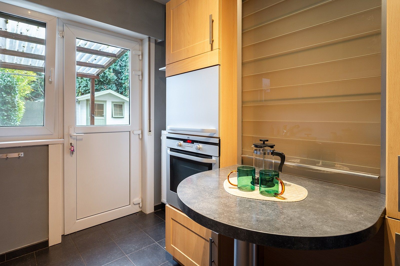 Gelijkvloers appartement met tuin foto 5