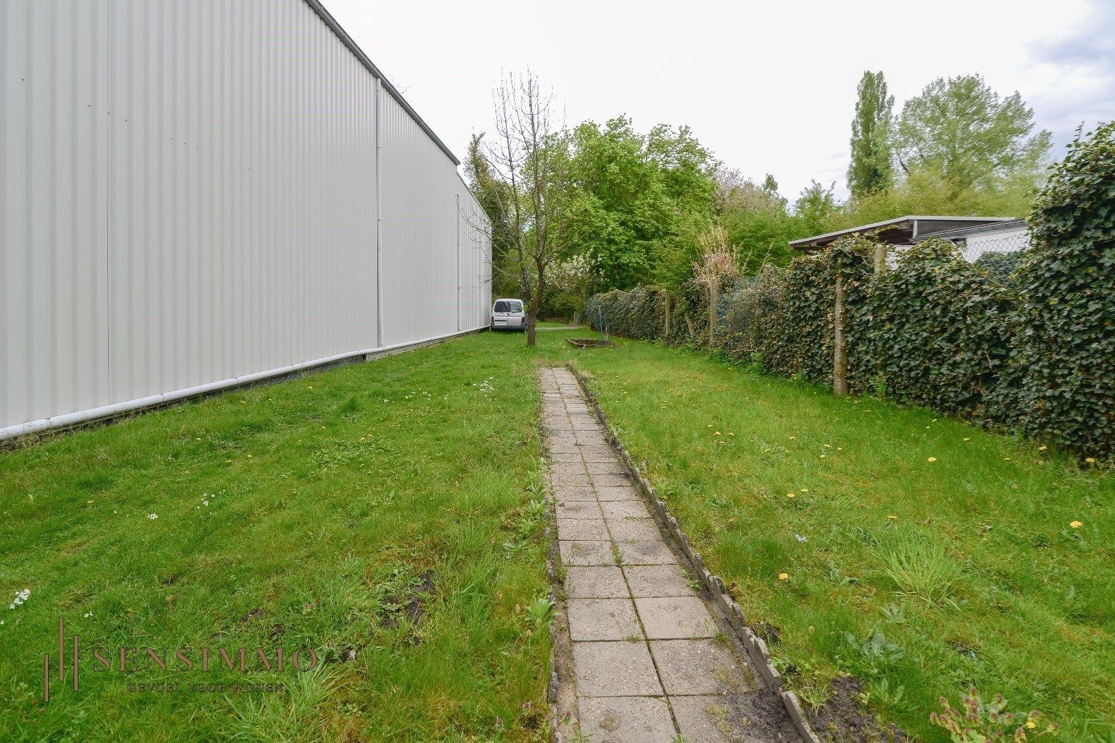 Instapklare duplex met 3 slpk + terras + parking in de levendige Vennestraat! foto 28