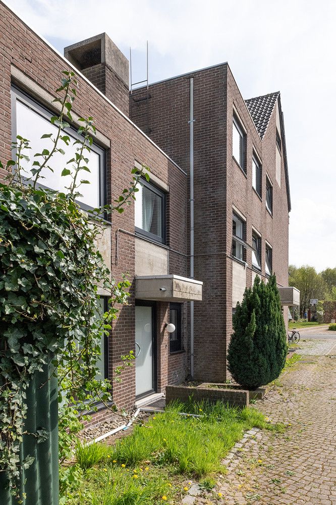 Gebouw met 7 studentenkamers en 1 duplex-appartement foto 10
