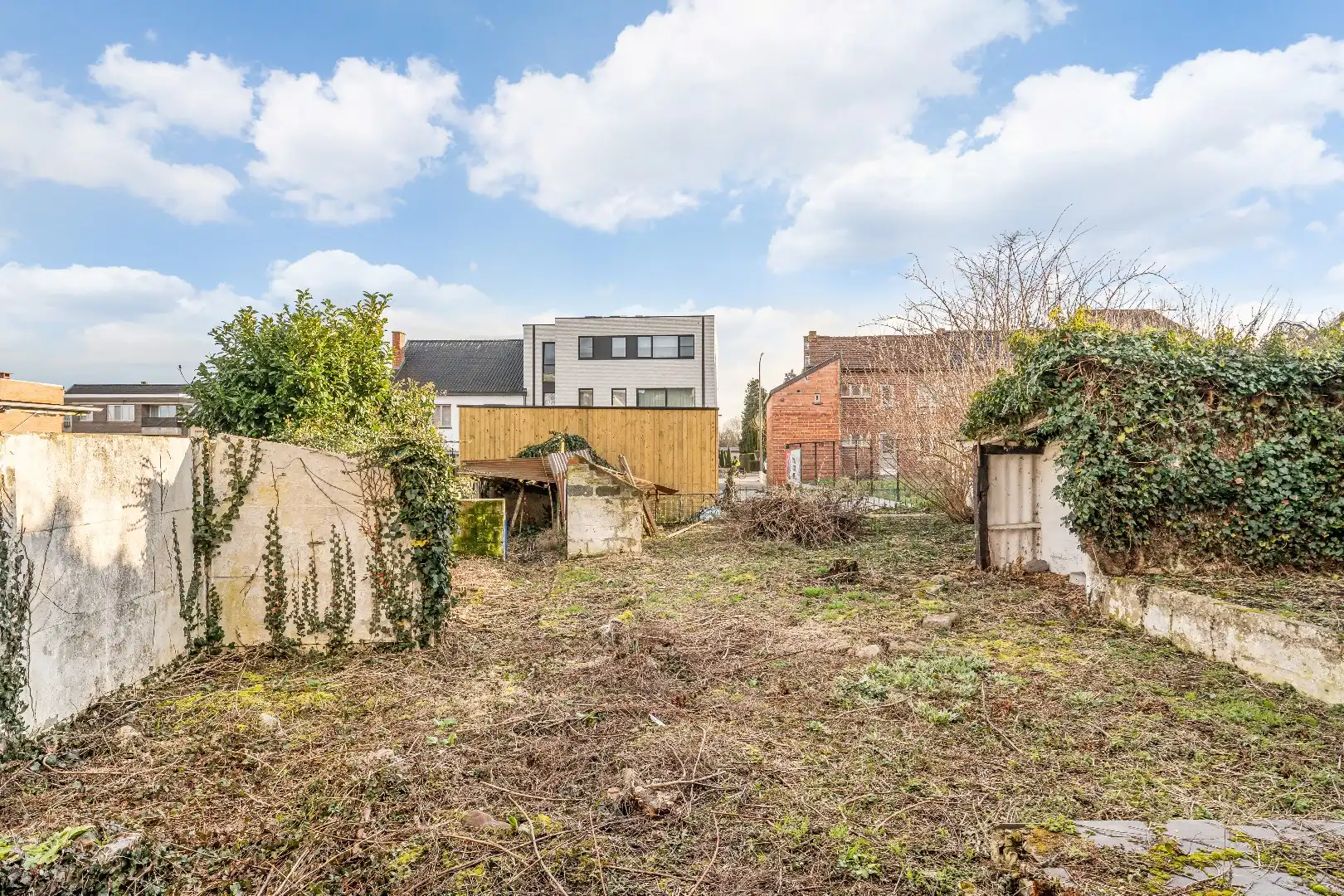 Projectgrond met te slopen woning aan het dorpsplein van Hoeselt – met omgevingsvergunning voor bouw van 5 eenheden  foto 13