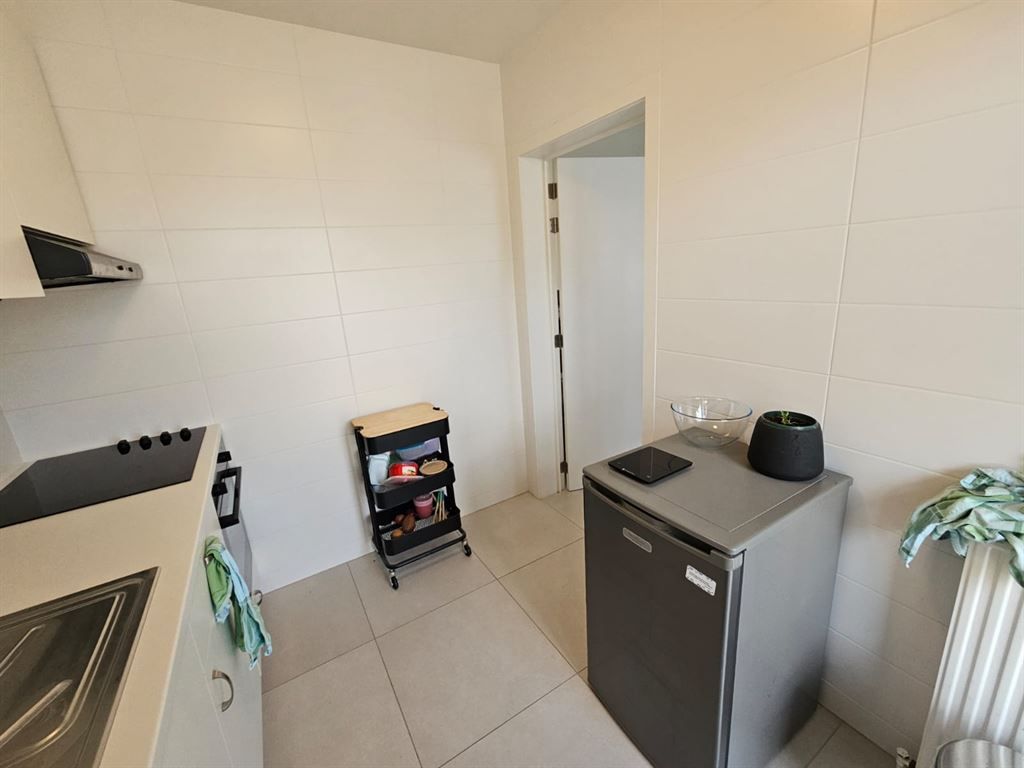 Goedgelegen en volledig vernieuwd appartement foto 9