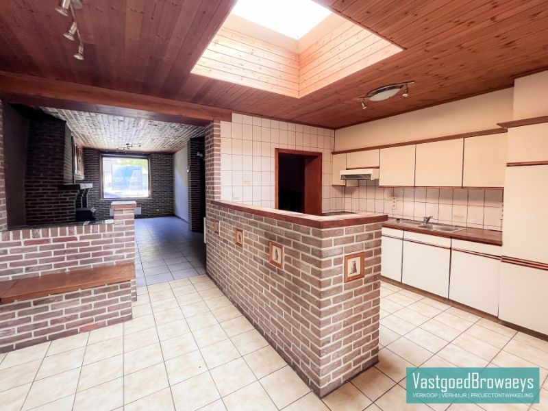 Te renoveren woning met zonrijke tuin nabij het station foto 7