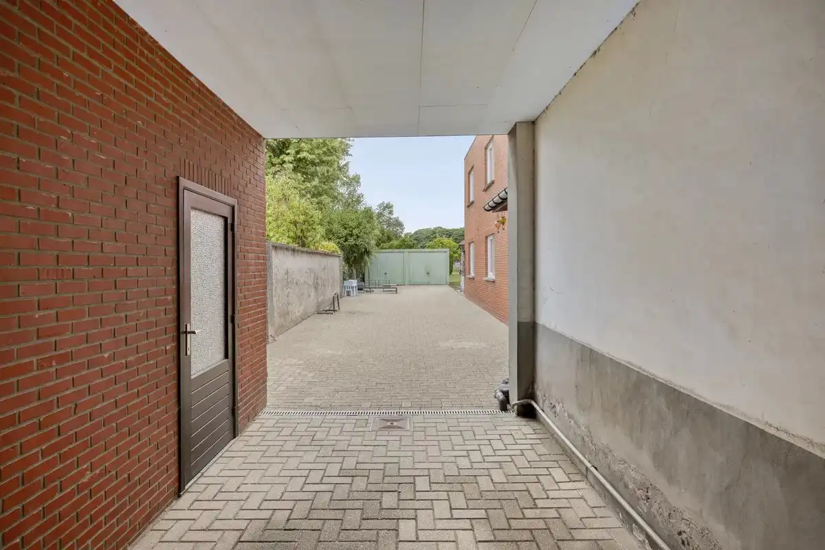 OPBRENGSTEIGENDOM BESTAANDE UIT TWEE RUIME EN VERHUURDE APPARTEMENTEN IN HERK-DE-STAD foto 12
