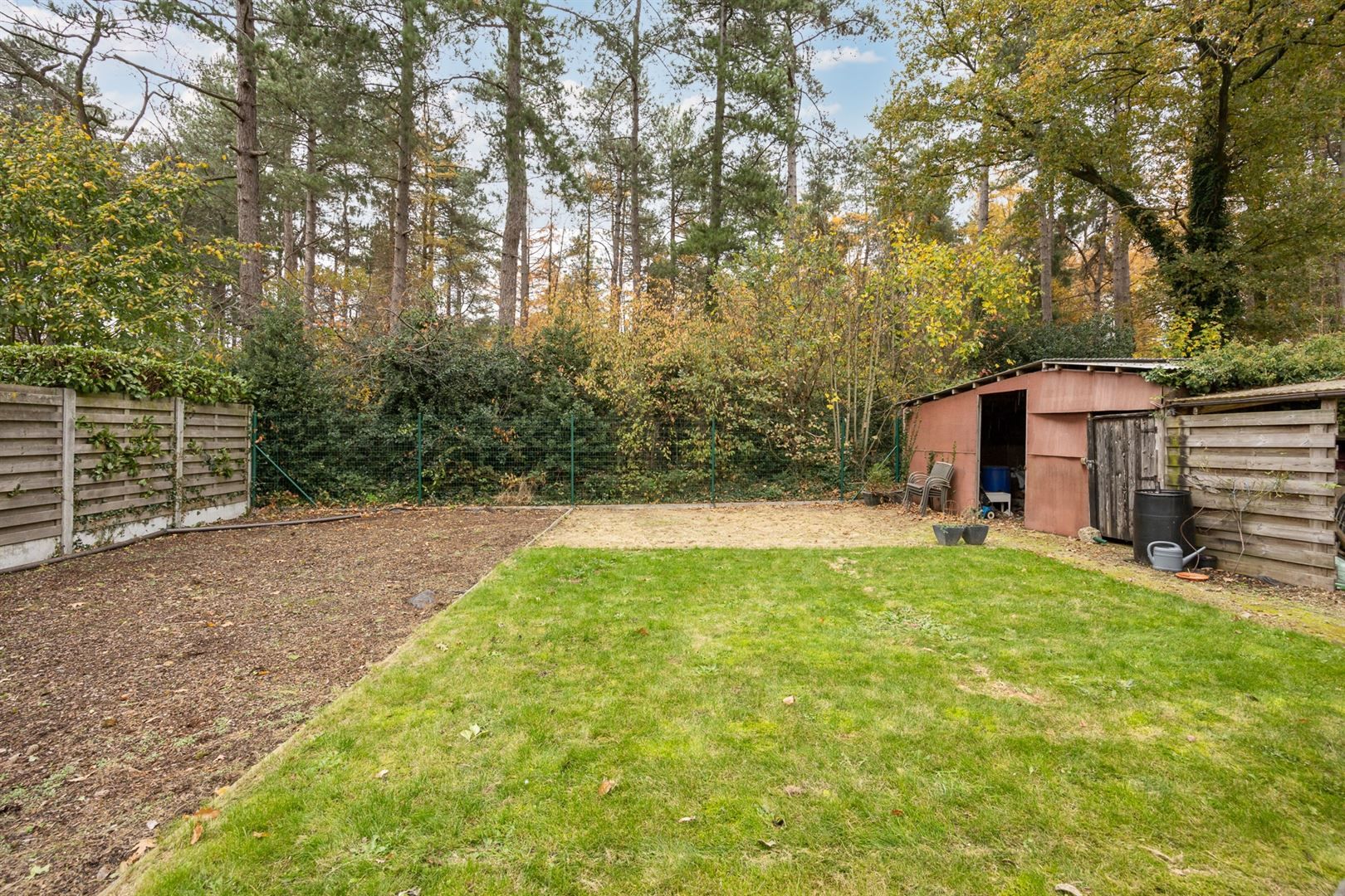 Woning op toplocatie met ruime tuin en zicht op bosgebied. foto 24