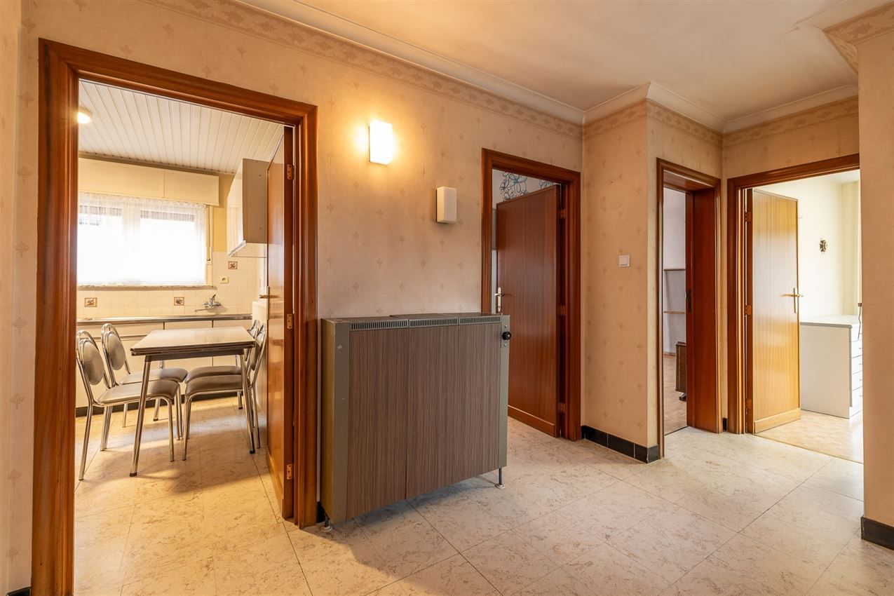 Te renoveren woning met 4 slk. in het hart van Averbode foto 8