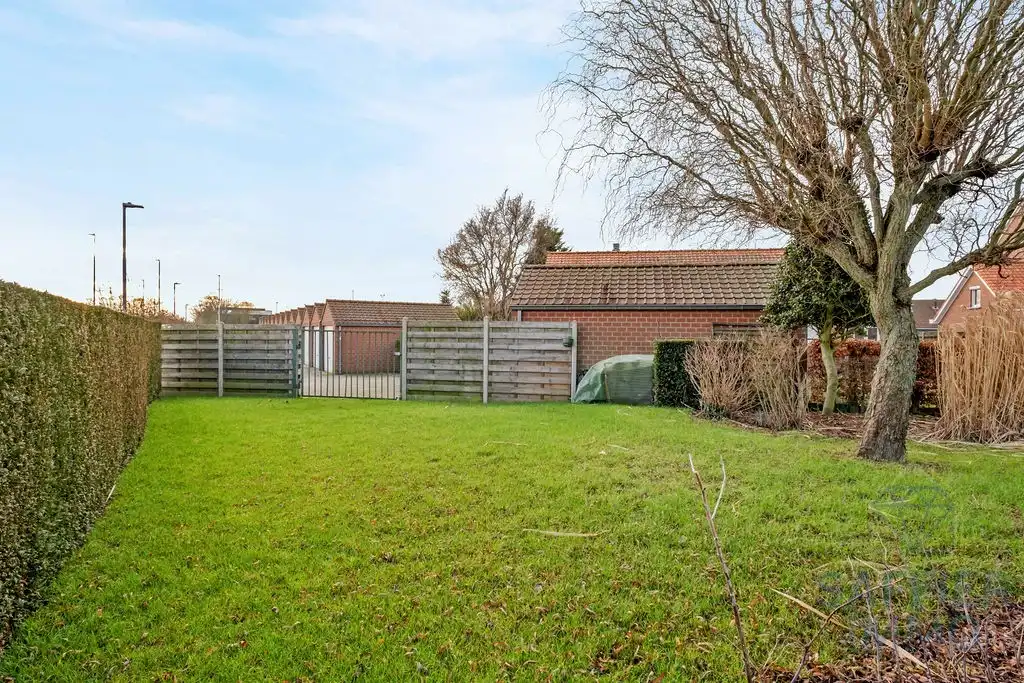 Ruime woning met 4 slaapkamers en grote tuin in het centrum van Ingelmunster foto 13