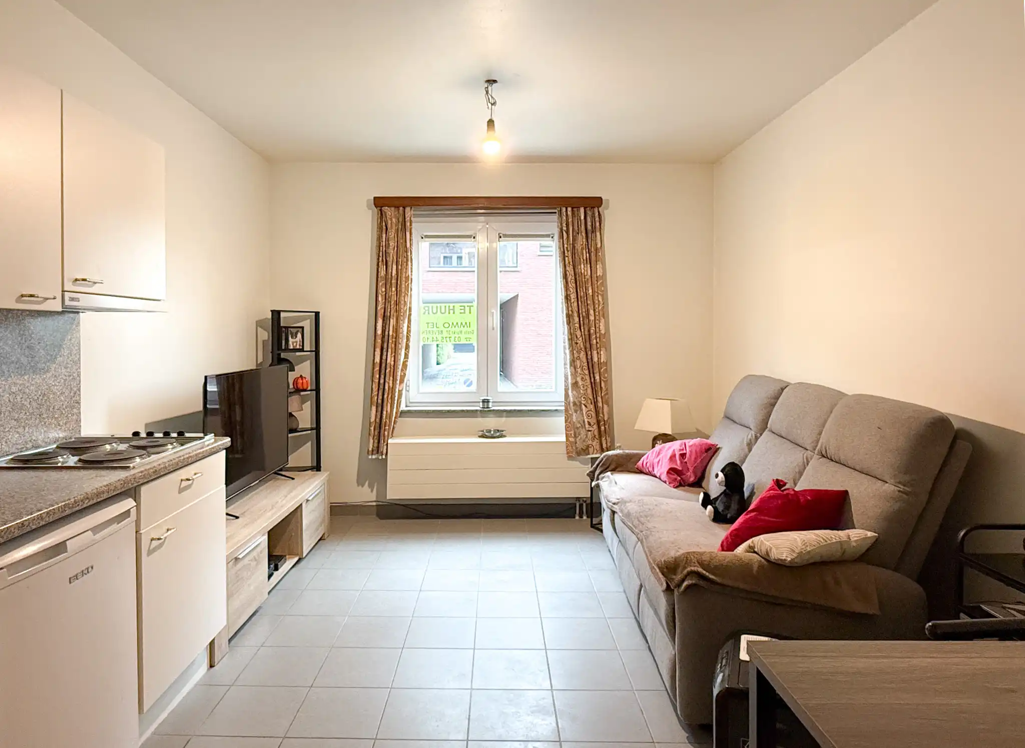 Gelijkvloers studio-appartement met garage foto 2