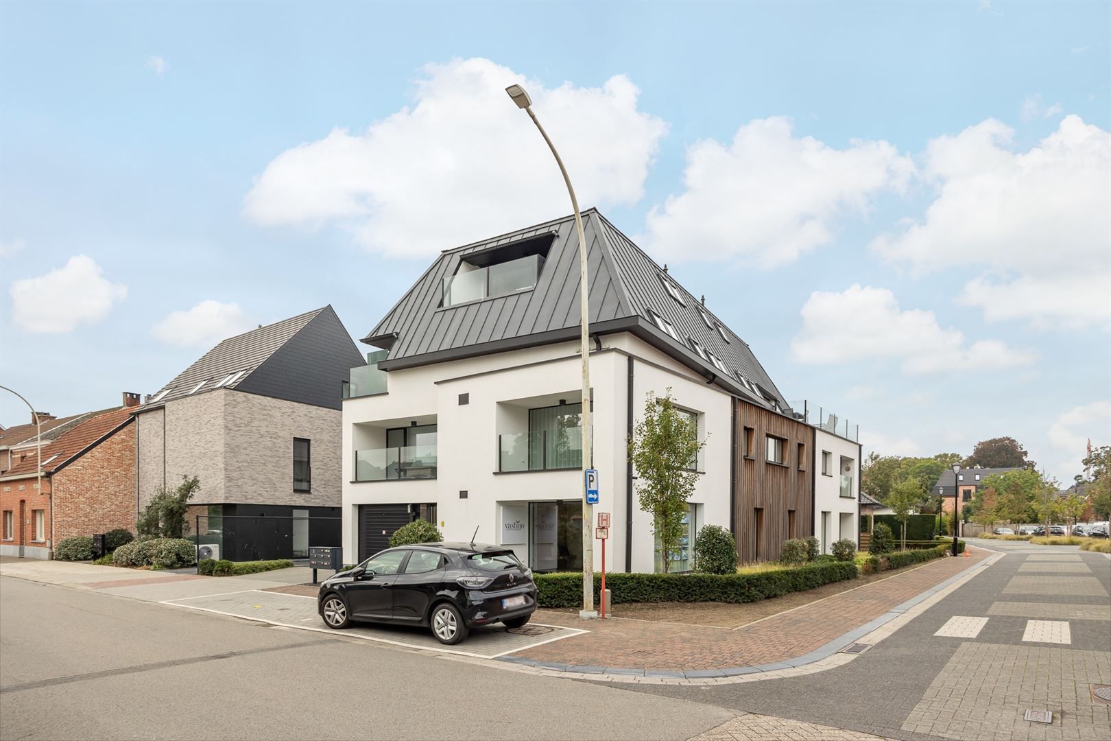 Lichtrijk gelijkvloersappartement met zuid tuin en garage. foto 19