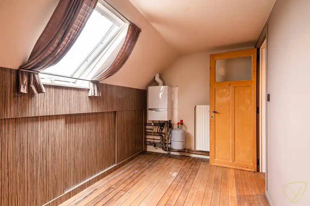 Ruime woning met zonnige tuin en veel potentieel in de Desire Goethalsstraat foto 19