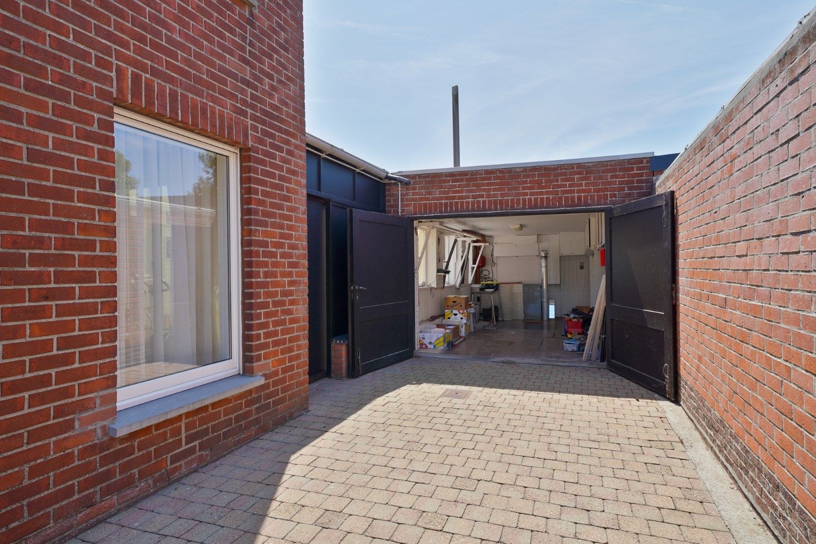 Halfopen woning met garage en zonnig terras te Mariakerke foto 20