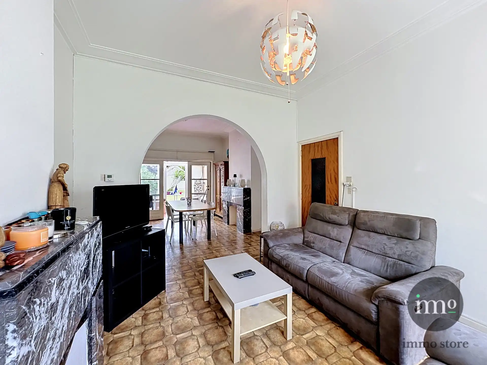 CHARMANTE driegevel woning met GEZELLIGE TUIN foto 5